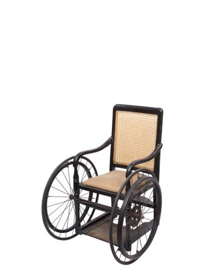 Period black wicker wheelchair